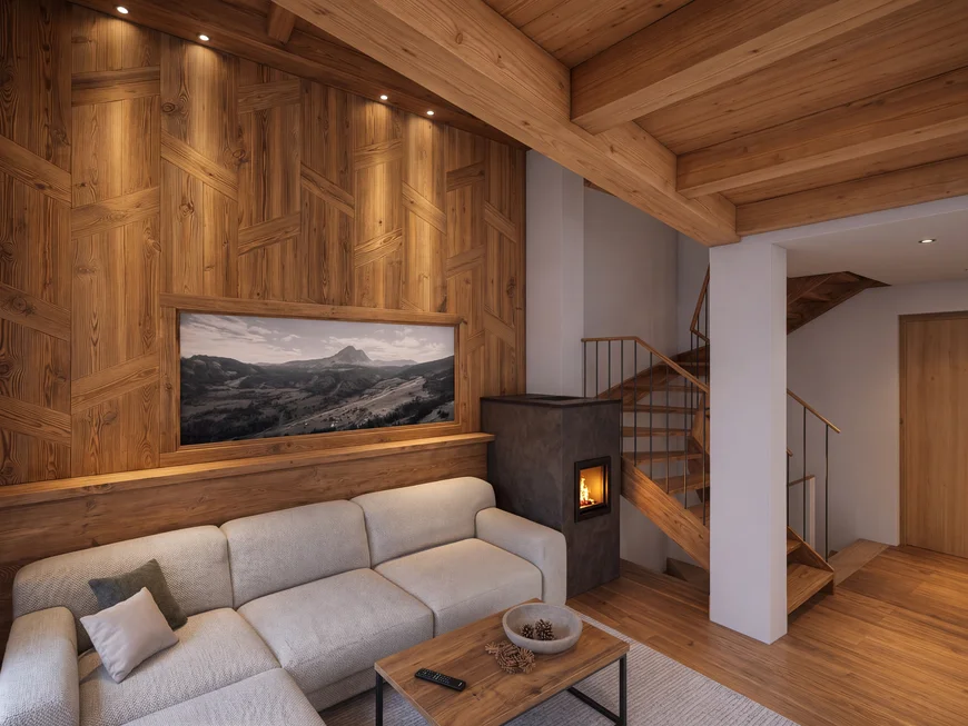 Ihr Chalet in den Dolomiten mit privater Sauna Wohnzimmer mit hellem Sofa, Holzvertäfelung, Kamin und Treppe